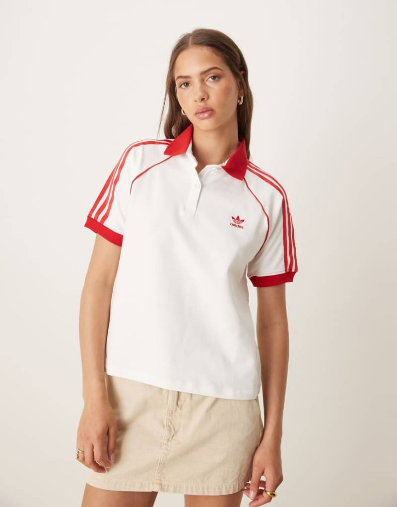 adidas Originals - adicolor - Poloshirt in Weiß mit den 3 Streifen und Akzenten in Rot von adidas Originals