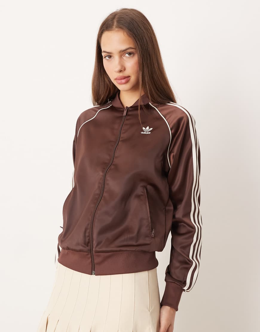 adidas Originals - adicolor - Trainingsoberteil in Braun-Brown adidas Originals - adicolor - Trainingsoberteil in Braun-Brown von adidas Originals