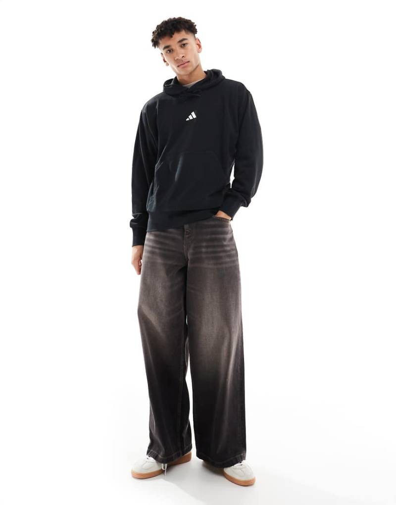 adidas - Essentials Feelcozy - Frottee-Kapuzenpullover in Schwarz/Weiß von adidas performance
