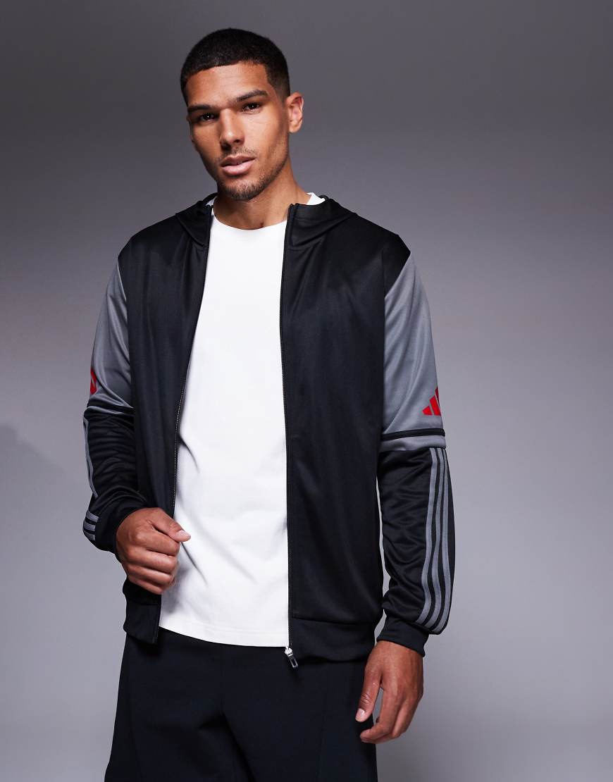 adidas Football - Squadra - Kapuzenpullover in Schwarz und Rot adidas Football - Squadra - Kapuzenpullover in Schwarz und Rot von adidas performance
