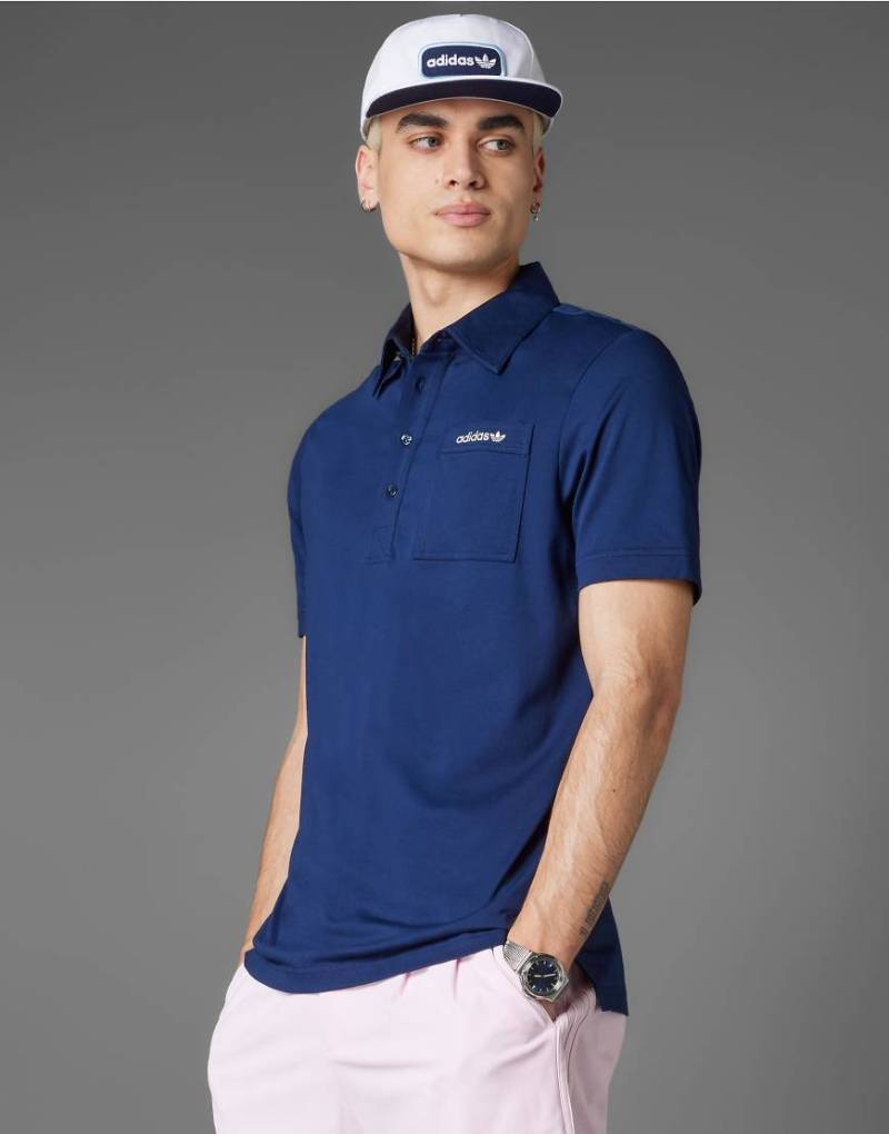 adidas Originals - Archive - Golf-Polohemd in Night Indigo mit Brusttasche-Blau adidas Originals - Archive - Golf-Polohemd in Night Indigo mit Brusttasche-Blau von adidas performance