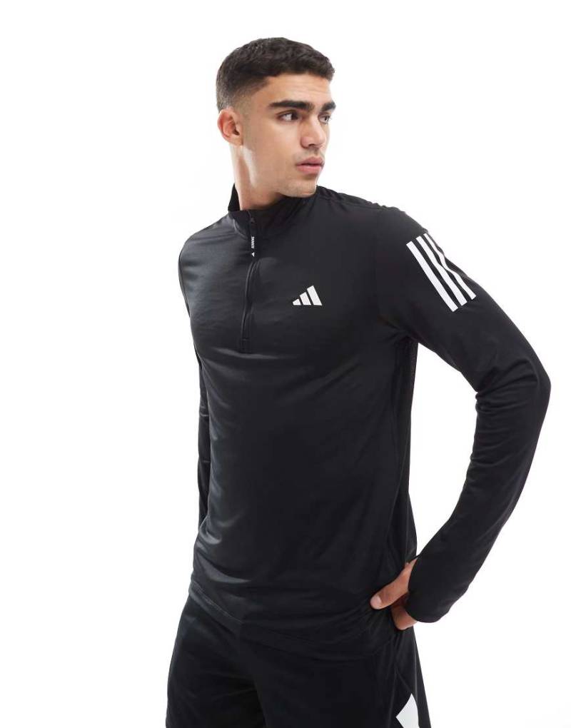 adidas Training - Own The Run - Oberteil in Schwarz mit kurzem Reißverschluss von adidas performance
