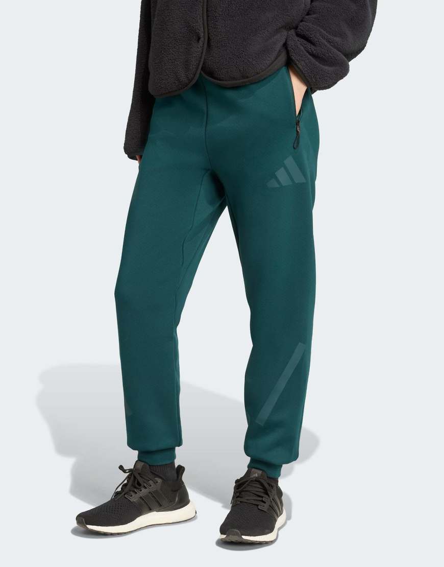 adidas Performance - Adidas Z. N.E. - Hose in Aurora Ivy-Grün adidas Performance - Adidas Z. N.E. - Hose in Aurora Ivy-Grün von adidas performance