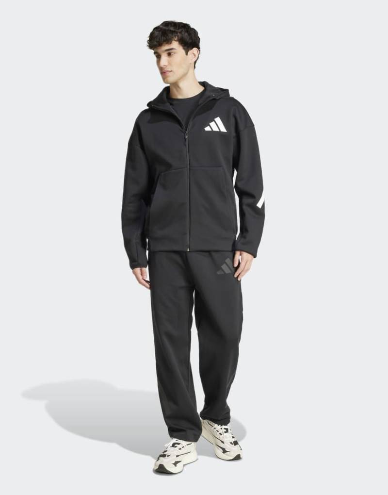 adidas Performance - Adidas Z. N.E. - Hose in Schwarz mit offenem Saum von adidas performance