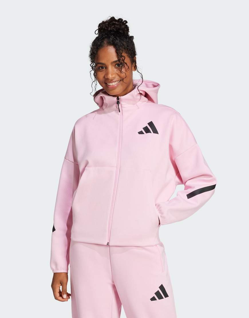 adidas Performance - Adidas Z. N.E. - Kapuzenjacke in True Pink mit durchgehendem Reißverschluss-Rosa adidas Performance - Adidas Z. N.E. - Kapuzenjacke in True Pink mit durchgehendem Reißverschluss-Rosa von adidas performance