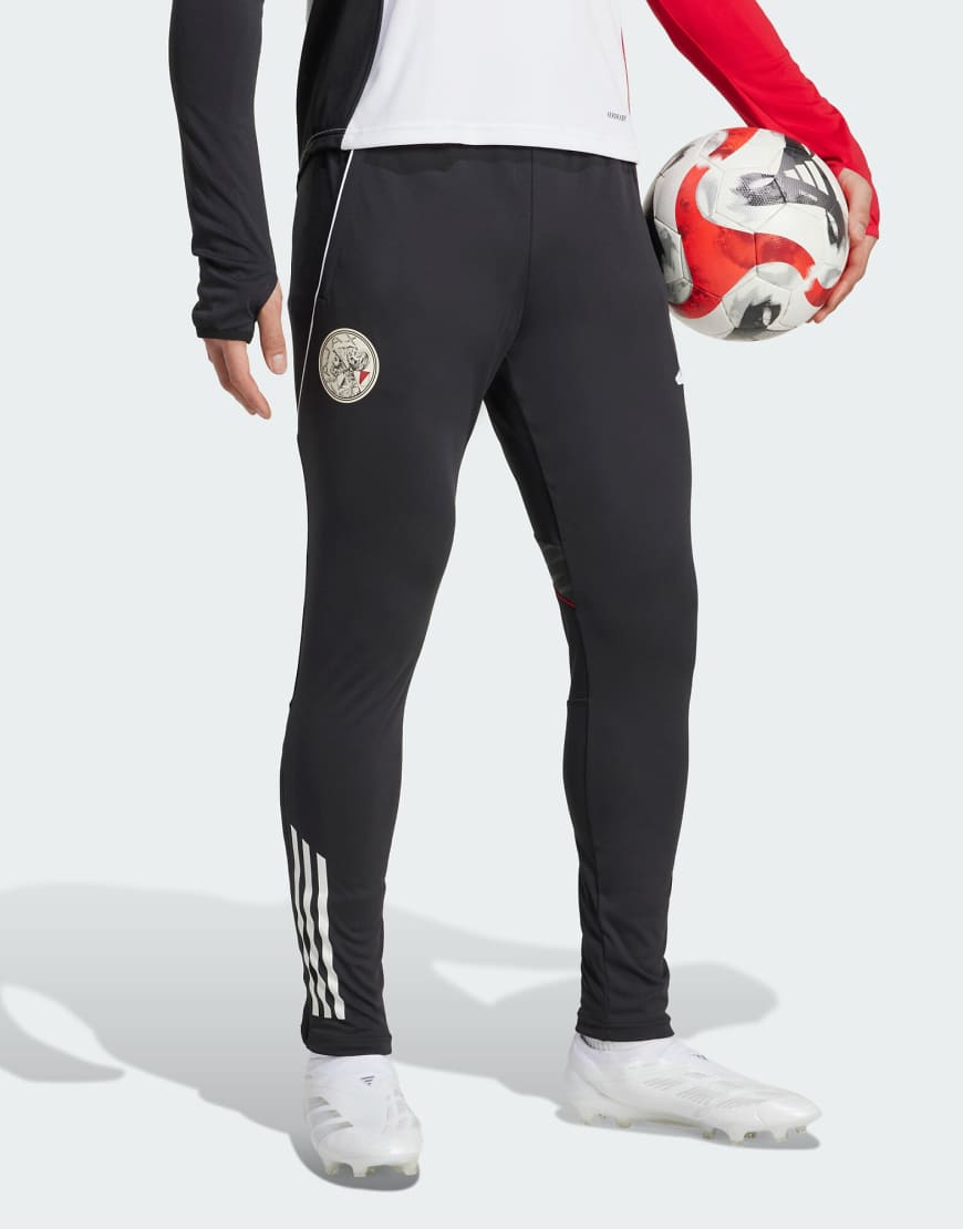 adidas Performance - Ajax Amsterdam Tiro 25 Competition - Trainingshose in Schwarz/Weiß/Bold-Rot von adidas performance