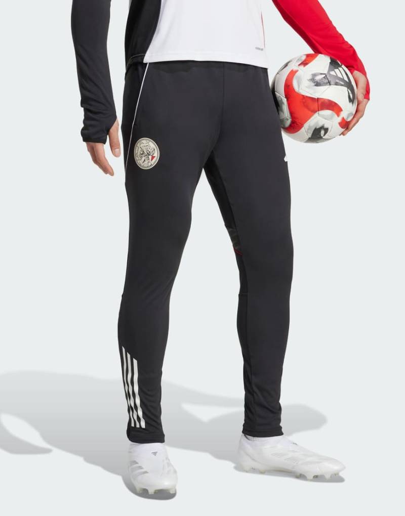 adidas Performance - Ajax Amsterdam Tiro 25 Competition - Trainingshose in Schwarz/Weiß/Bold-Rot von adidas performance