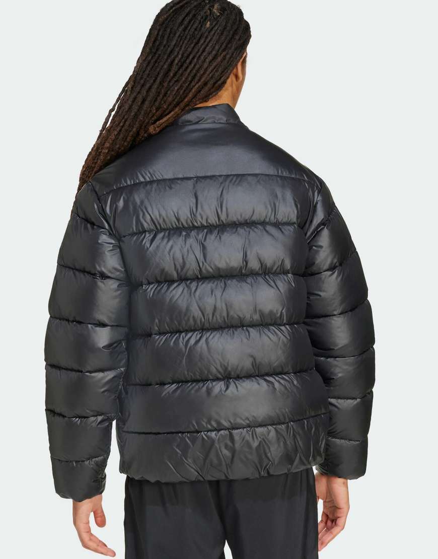adidas Performance - Essentials Climawarm - Jacke in Schwarz mit synthetischen Daunen adidas Performance - Essentials Climawarm - Jacke in Schwarz mit synthetischen Daunen von adidas performance