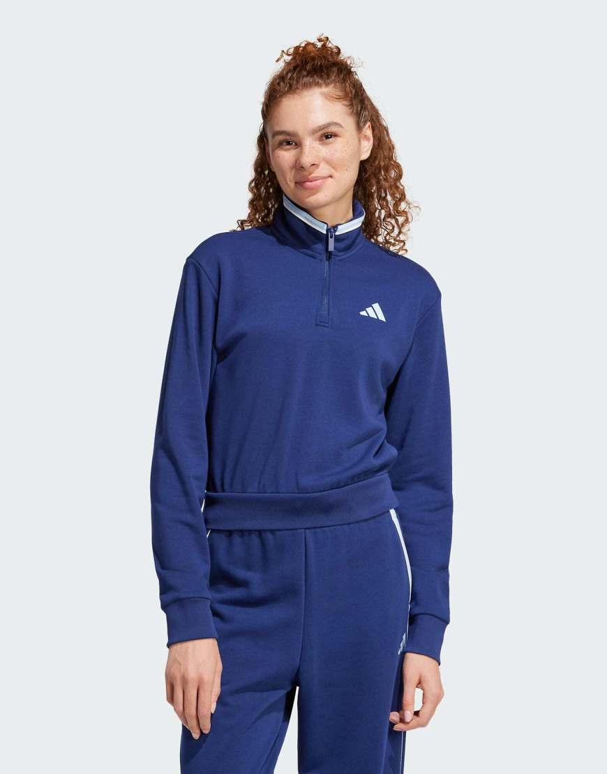 adidas Performance - Essentials - Color Pop - Cropped-Trainingsjacke aus French Terry in Dunkelblau mit kurzem Reißverschluss adidas Performance - Essentials - Color Pop - Cropped-Trainingsjacke aus French Terry in Dunkelblau mit kurzem Reißverschluss von adidas performance