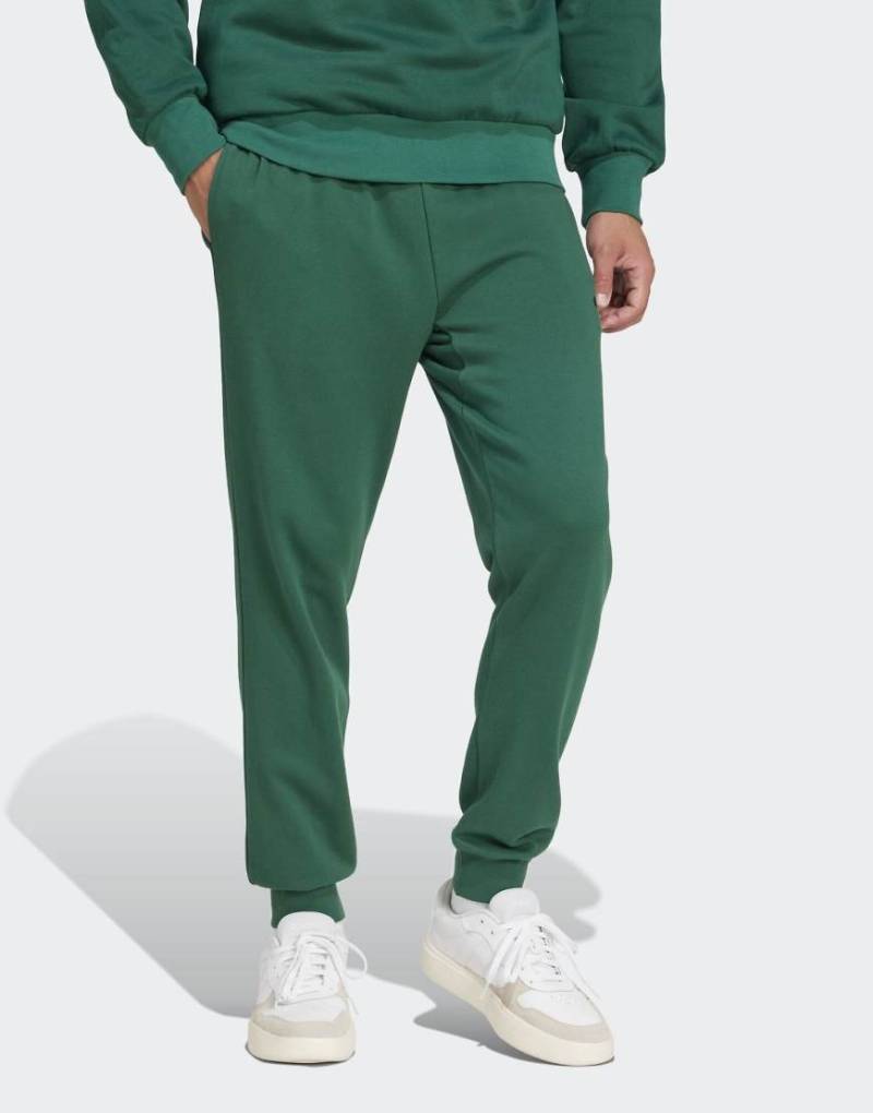 adidas Performance - Essentials - Feel Cozy - Hose aus French Terry in College-Grün / Schwarz von adidas performance
