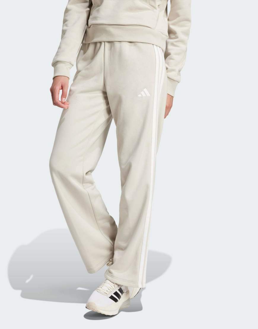 adidas Performance - Essentials - Hose aus French Terry in Beige / Weiß mit drei Streifen und offenem Saum-Neutral adidas Performance - Essentials - Hose aus French Terry in Beige / Weiß mit drei Streifen und offenem Saum-Neutral von adidas performance