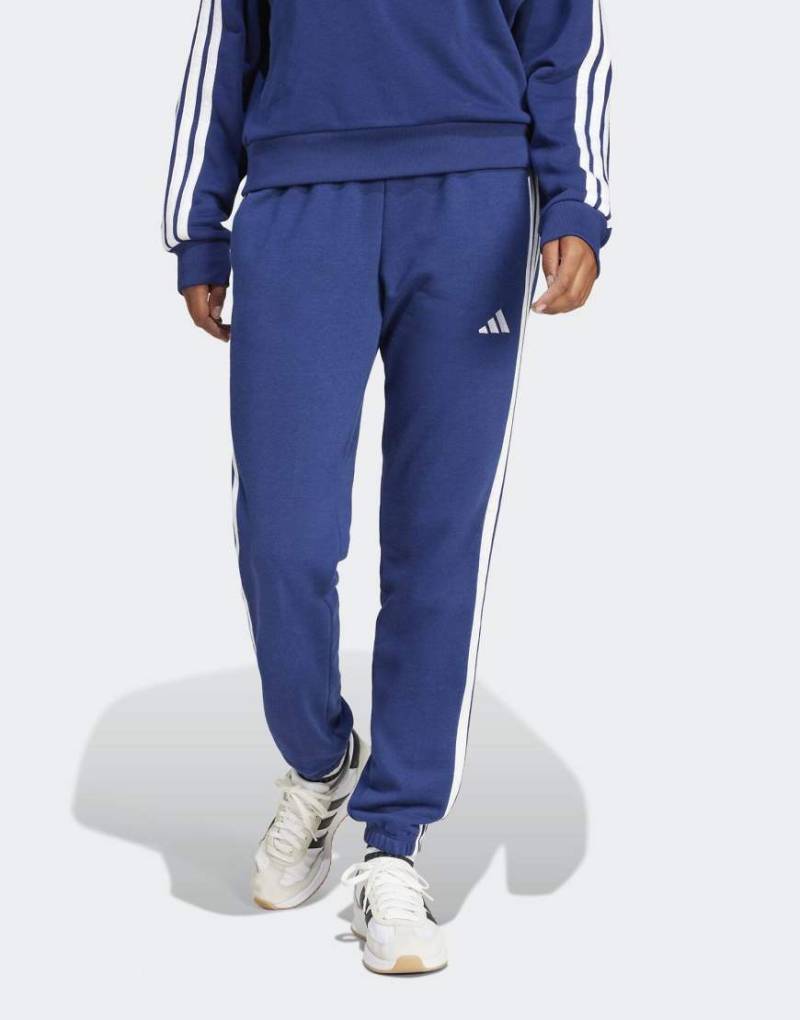 adidas Performance - Essentials - Hose in Dunkelblau / Weiß aus French Terry mit Bündchen und den 3 Streifen von adidas performance