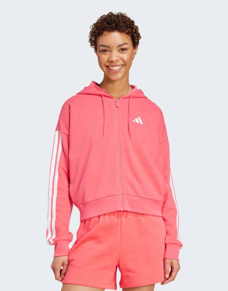 adidas Performance - Essentials - Kapuzenjacke aus French Terry in Rosa und Weiß mit den drei Streifen-Rot von adidas performance
