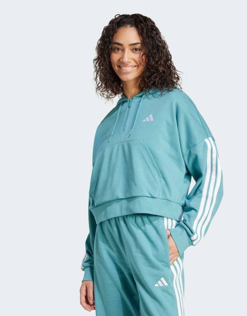 adidas Performance - Essentials - Kapuzenpullover aus French Terry in Powder Teal/Weiß mit kurzem Reißverschluss und den drei Streifen-Blau von adidas performance
