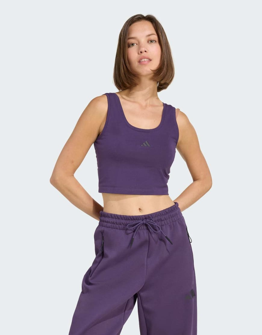 adidas Performance - Essentials - Lifestyle-Tanktop aus Baumwolle in Aurora Plum / Schwarz mit kleinem Logo-Lila von adidas performance