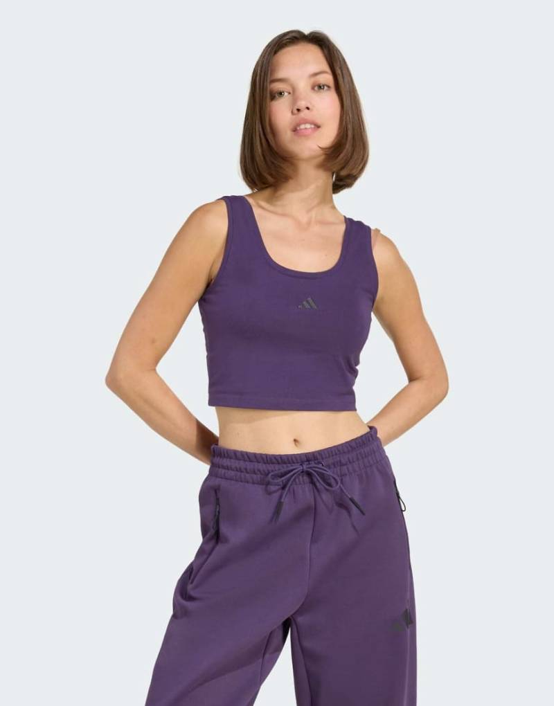 adidas Performance - Essentials - Lifestyle-Tanktop aus Baumwolle in Aurora Plum / Schwarz mit kleinem Logo-Lila von adidas performance