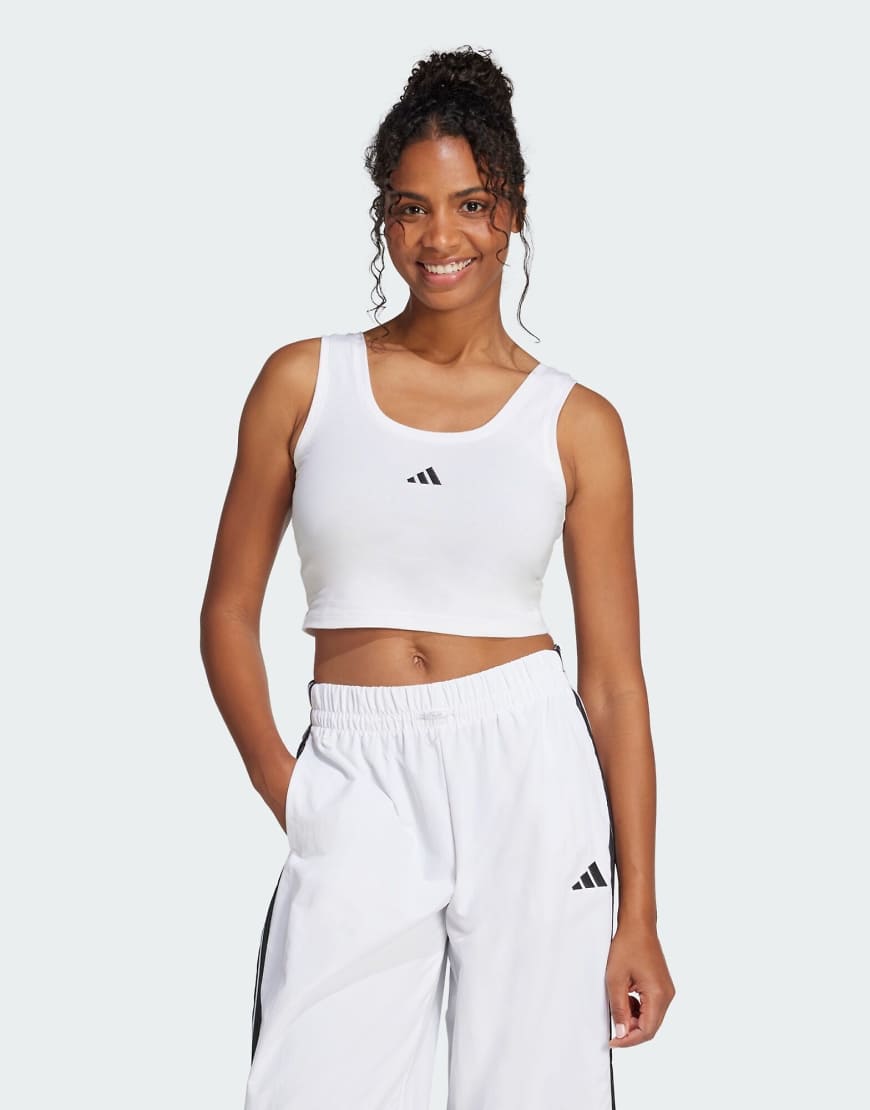 adidas Performance - Essentials - Lifestyle-Tanktop aus Baumwolle in Weiß / Schwarz mit kleinem Logo adidas Performance - Essentials - Lifestyle-Tanktop aus Baumwolle in Weiß / Schwarz mit kleinem Logo von adidas performance