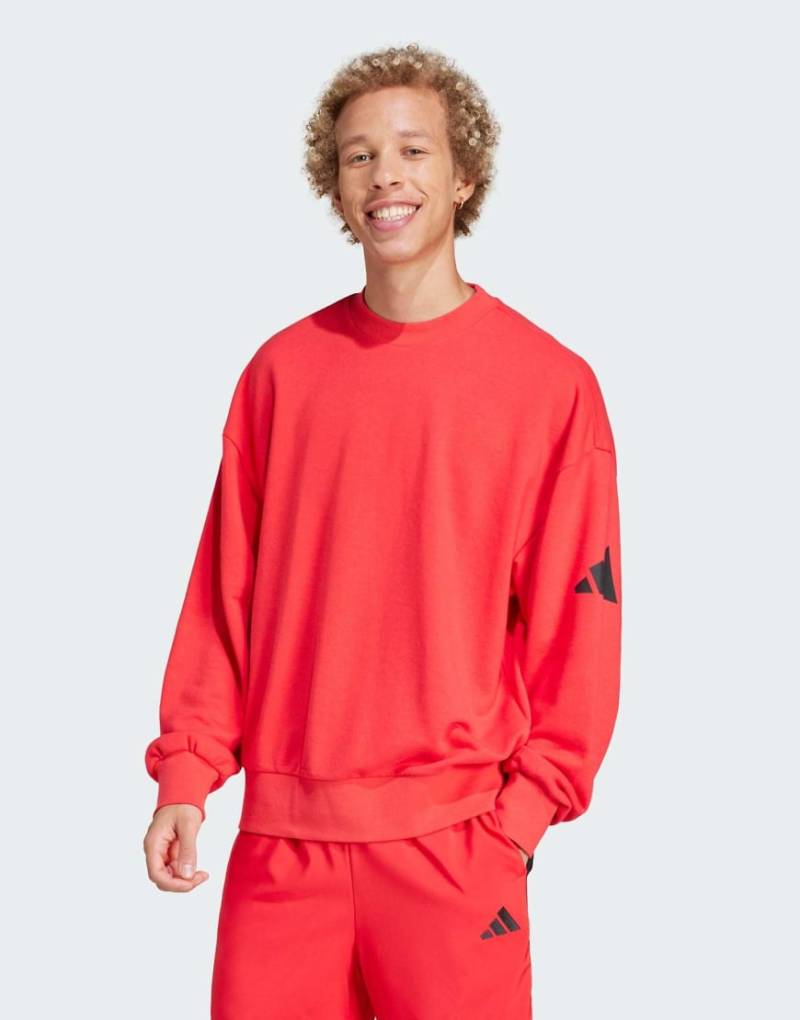 adidas Performance - Essentials - Locker sitzendes Sweatshirt in Pure Ruby und Schwarz mit 3-Balken-Logo-Rot von adidas performance