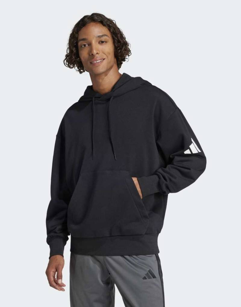 adidas Performance - Essentials - Loose-Fit-Kapuzenpullover aus French Terry in Schwarz / Weiß mit 3-Balken-Logo von adidas performance