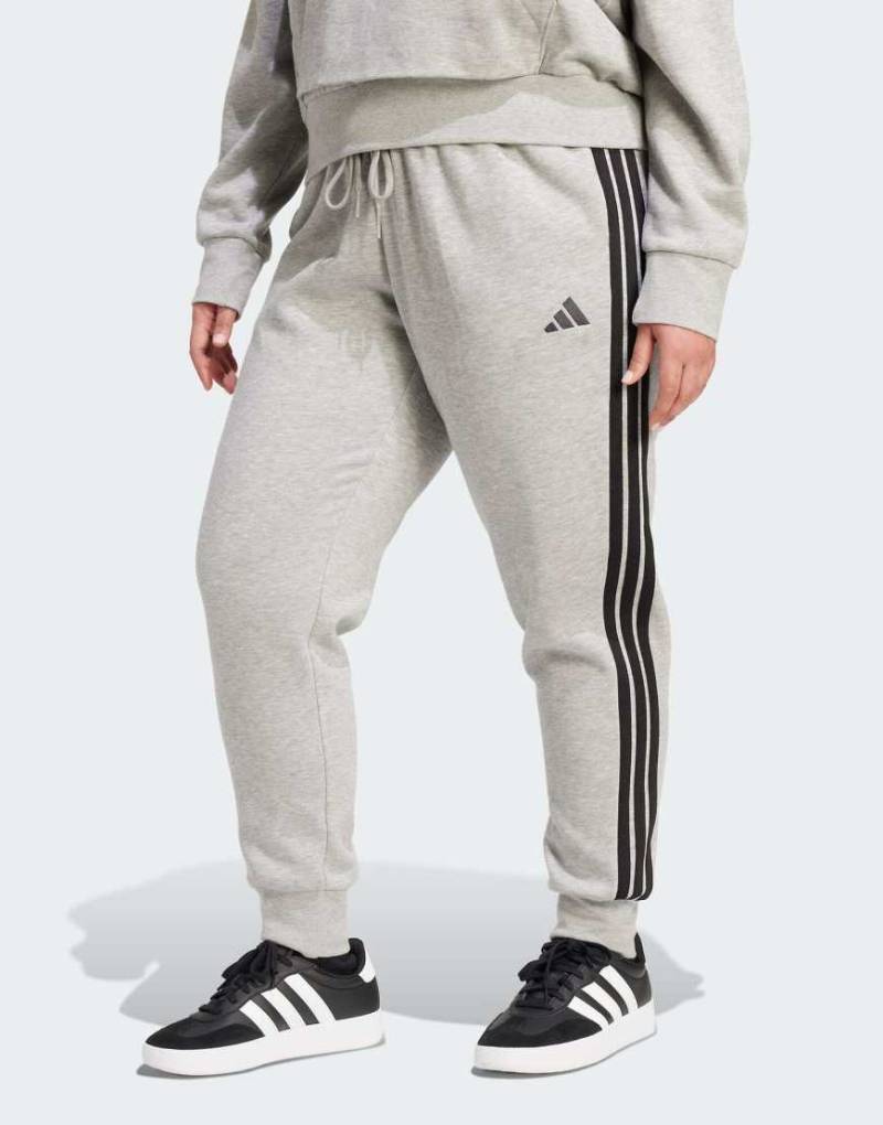adidas Performance - Essentials - Schmal geschnittene Hose (Plus-Size) in mittlerem Heidegrau/Schwarz mit den 3 Streifen von adidas performance