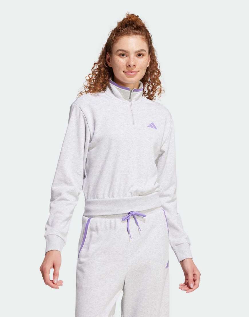 adidas Performance - Essentials - Trainingsjacke aus French-Terry-Frottee in Hellgrau meliert mit Farbakzent und Viertelreißverschluss adidas Performance - Essentials - Trainingsjacke aus French-Terry-Frottee in Hellgrau meliert mit Farbakzent und Viertelreißverschluss von adidas performance
