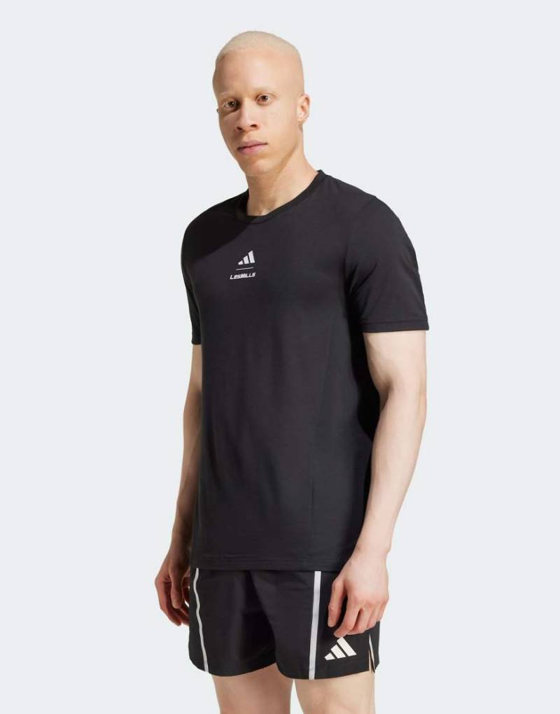 adidas Performance - Les Mills - T-Shirt in Schwarz mit Grafiklogo adidas Performance - Les Mills - T-Shirt in Schwarz mit Grafiklogo von adidas performance