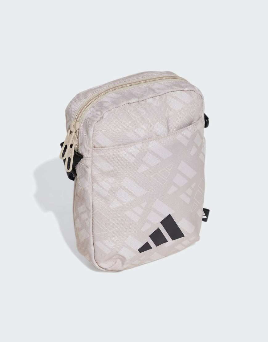 adidas Performance - Linear - Gemusterte Organizer-Tasche in Beige, Orbit Grey und Schwarz-Neutral adidas Performance - Linear - Gemusterte Organizer-Tasche in Beige, Orbit Grey und Schwarz-Neutral von adidas performance