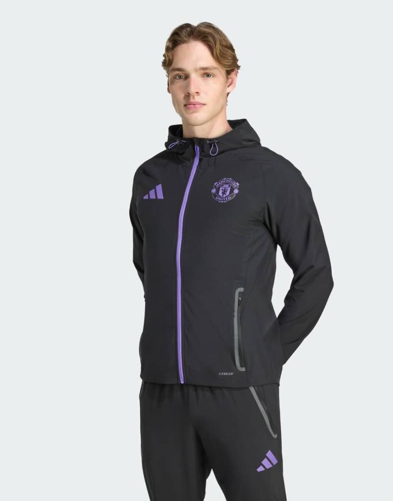 adidas Performance - Manchester United Tiro 25 - Competition Vis Tech - Auswärts-Trainingsjacke in Schwarz / Purple Rush von adidas performance