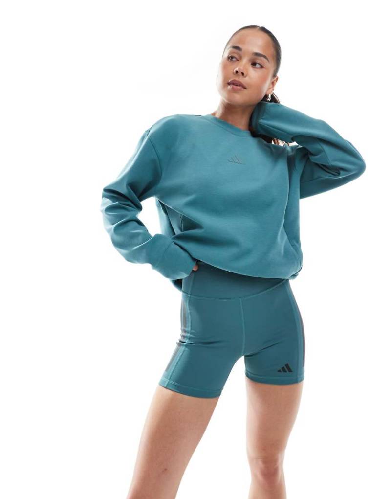 adidas Training - Optime - 1/4-lange Leggings in Preloved Teal mit 3 Streifen-Blau von adidas performance