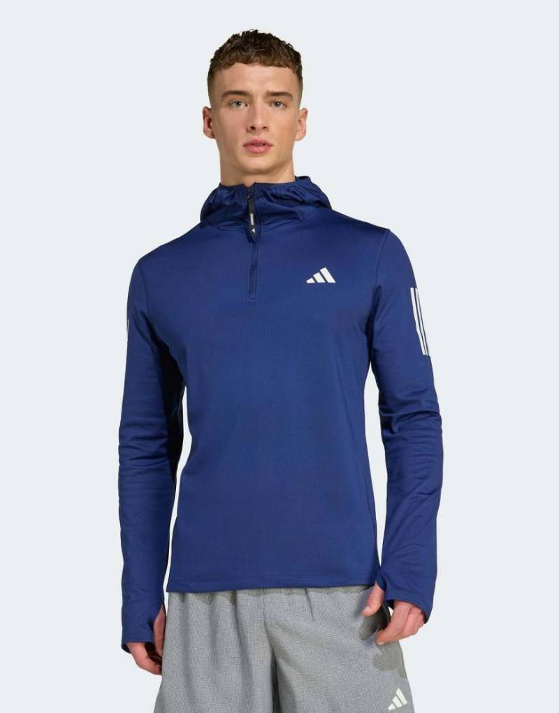 adidas Performance - Own the run Winterized - Jacke in Dunkelblau mit kurzem Reißverschluss von adidas performance