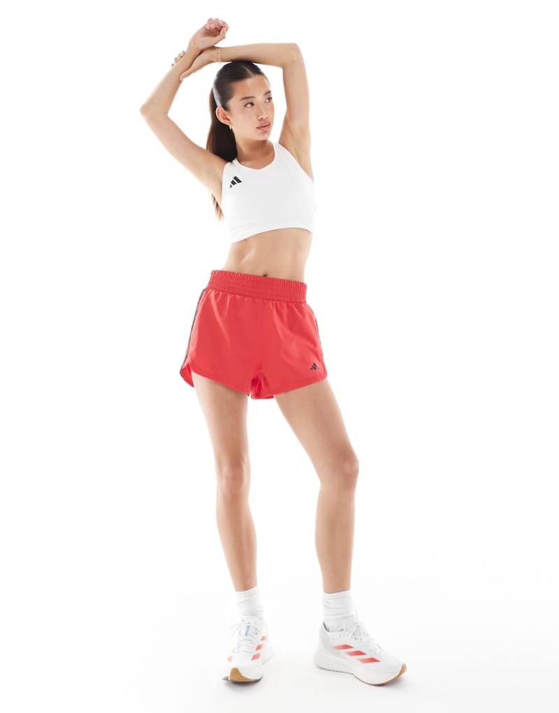 adidas Performance - Pacer - Trainingsshorts aus Webstoff in Pure Ruby/Weiß mit hohem Bund und den 3 Streifen-Rot von adidas performance