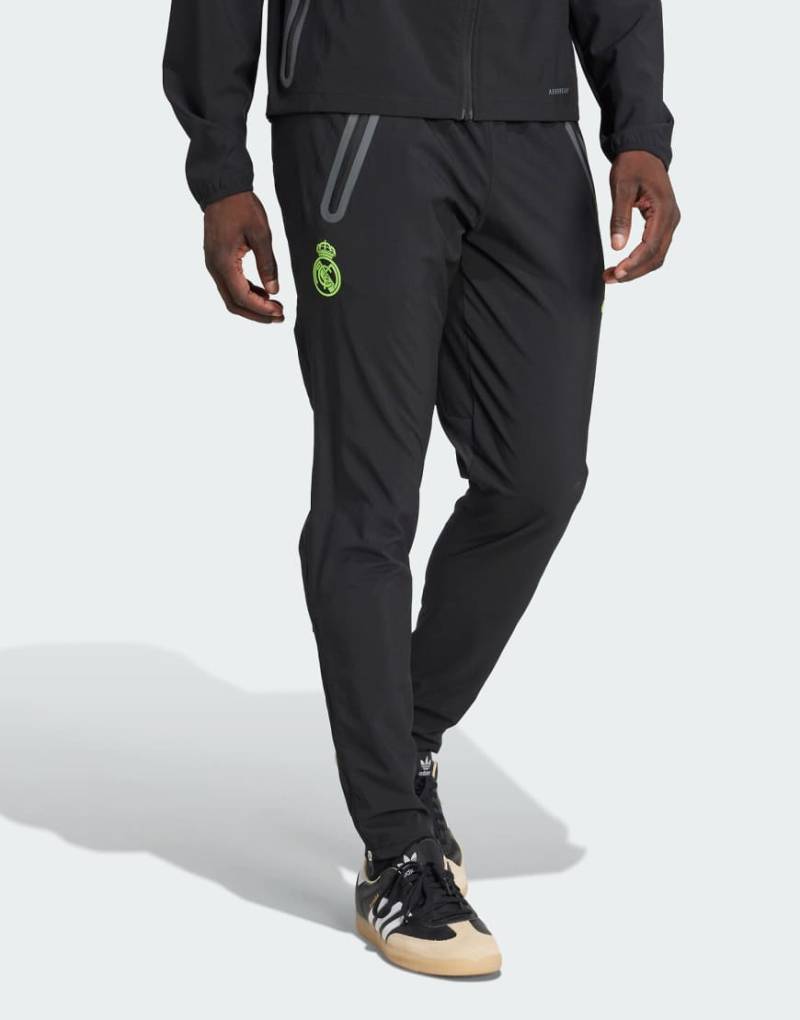 adidas Performance - Real Madrid Tiro 25 Pro Vis - Funktionale Auswärtsspiel-Hose in Schwarz/Lucid Lemon adidas Performance - Real Madrid Tiro 25 Pro Vis - Funktionale Auswärtsspiel-Hose in Schwarz/Lucid Lemon von adidas performance