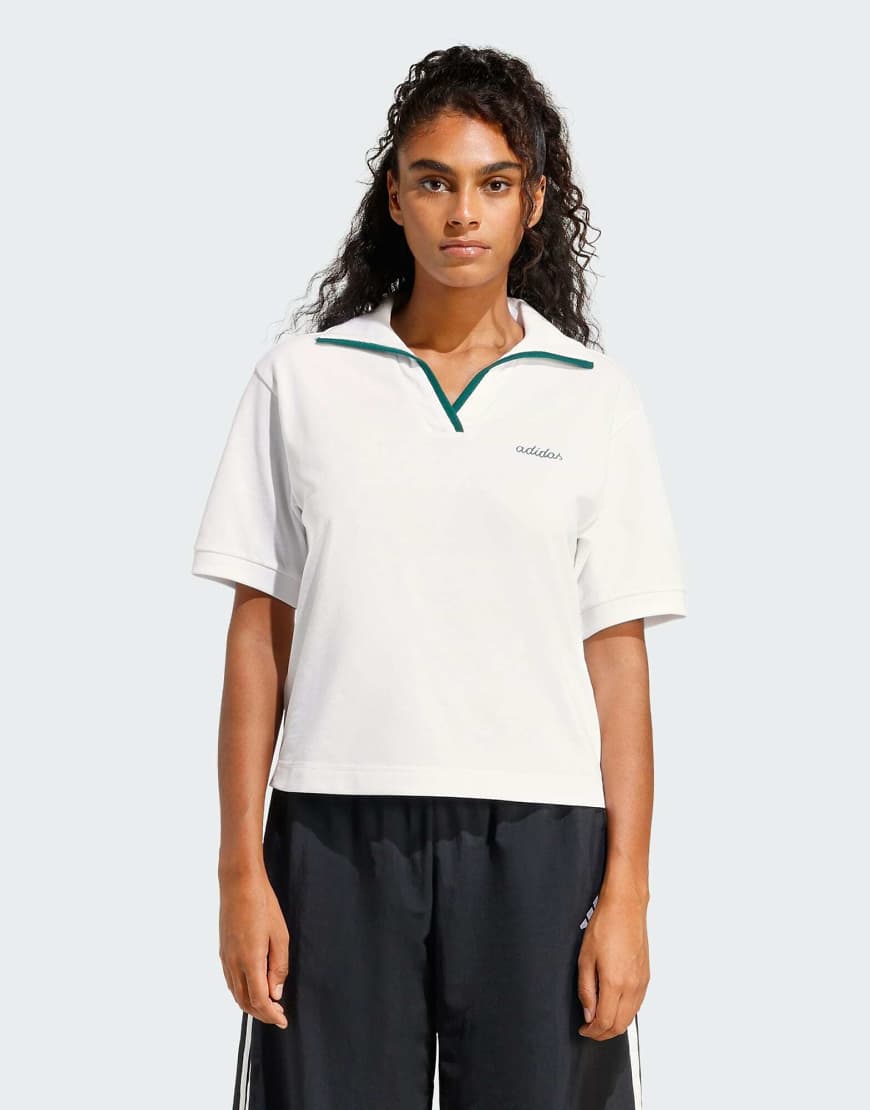 adidas Performance - Seasonal Essentials Colorpop - Polohemd in Weiß/College-Grün mit gesticktem Motiv von adidas performance