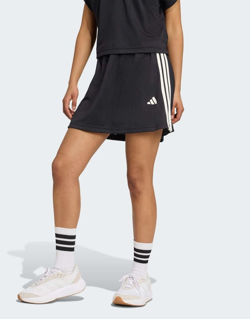 adidas Performance - Stadium - Tennis-Rock mit integrierten Shorts in Schwarz / Wollweiß mit Jacquardmuster von adidas performance