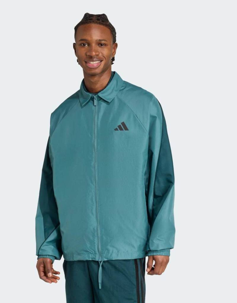 adidas Performance - Stadium - Trainingsoberteil in Preloved Teal / Aurora Ivy-Blau von adidas performance