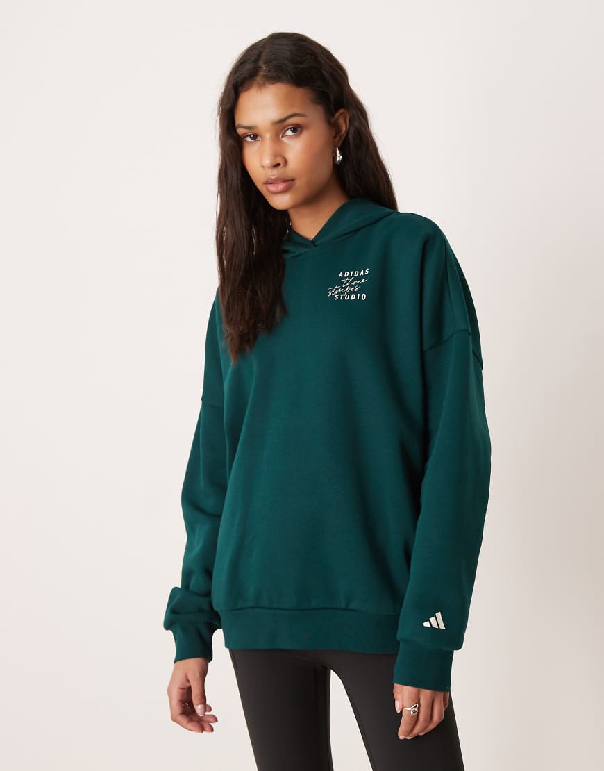 adidas Performance - Studios - Kapuzenpullover in Dunkelgrün mit den drei Streifen von adidas performance