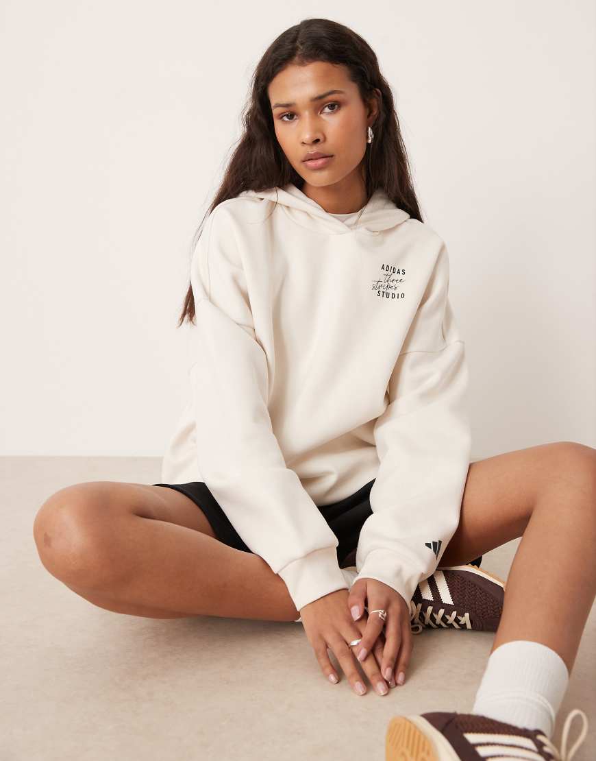 adidas Performance - Studios - Kapuzenpullover in Grau mit den drei Streifen von adidas performance