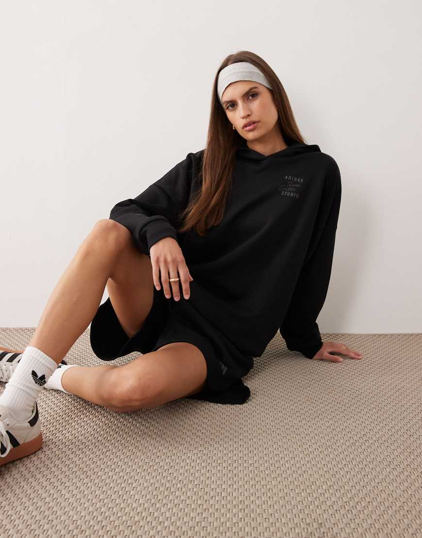 adidas Performance - Studios - Kapuzenpullover in Schwarz mit den drei Streifen von adidas performance