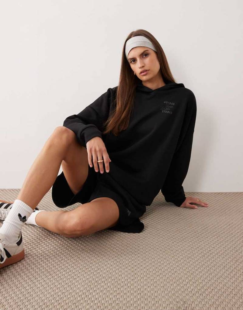 adidas Performance - Studios - Kapuzenpullover in Schwarz mit den drei Streifen von adidas performance