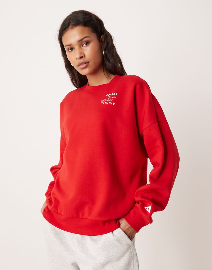 adidas Performance - Studios - Sweatshirt in Rot mit den drei Streifen von adidas performance