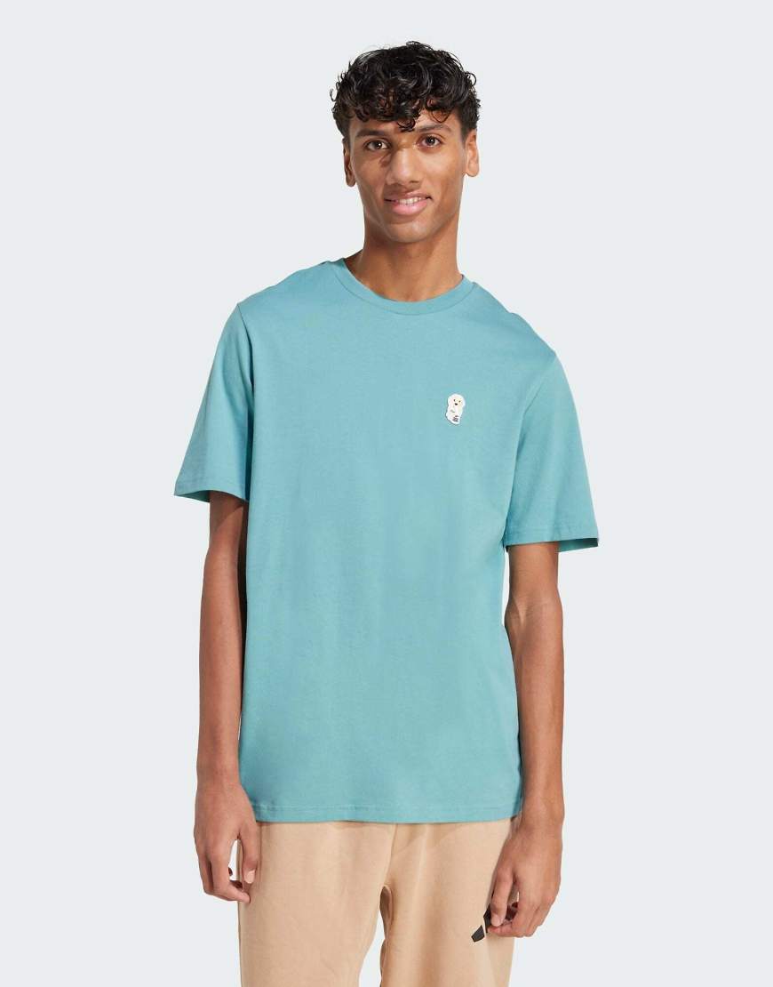 adidas Performance - T-Shirt in Preloved Teal mit Hundesocken-Grafikaufnäher-Blau von adidas performance