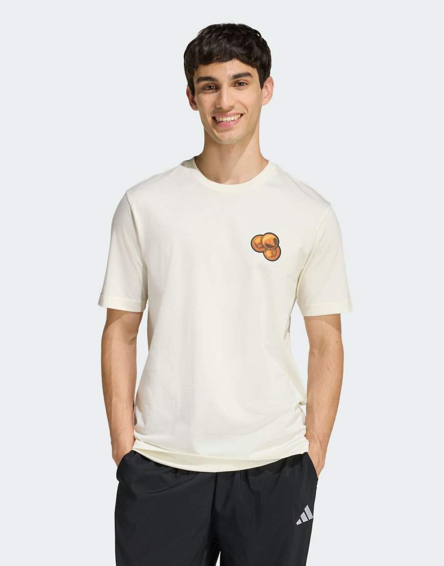 adidas Performance - T-Shirt in Wollweiß mit Kaugummiautomat-Print von adidas performance