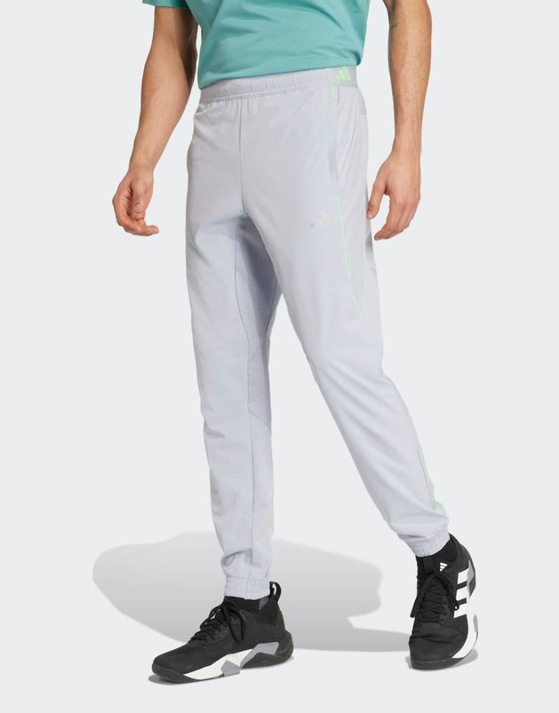 adidas Performance - Tech Apparel - Trainingshose in Halo Silver/Lime Burst-Silber von adidas performance