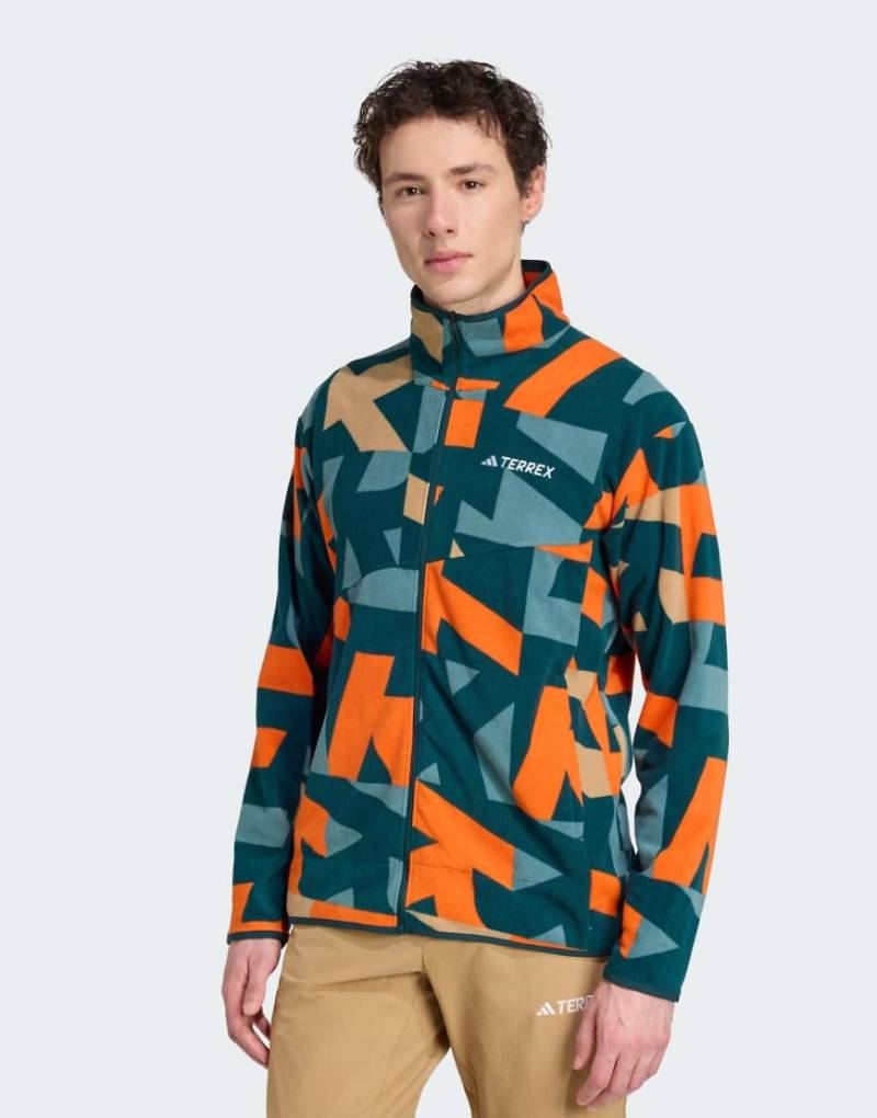 adidas Performance - Terrex - Fleecejacke in Aurora Ivy / Semi Impact Orange mit durchgehendem Reißverschluss und Print-Grün von adidas performance