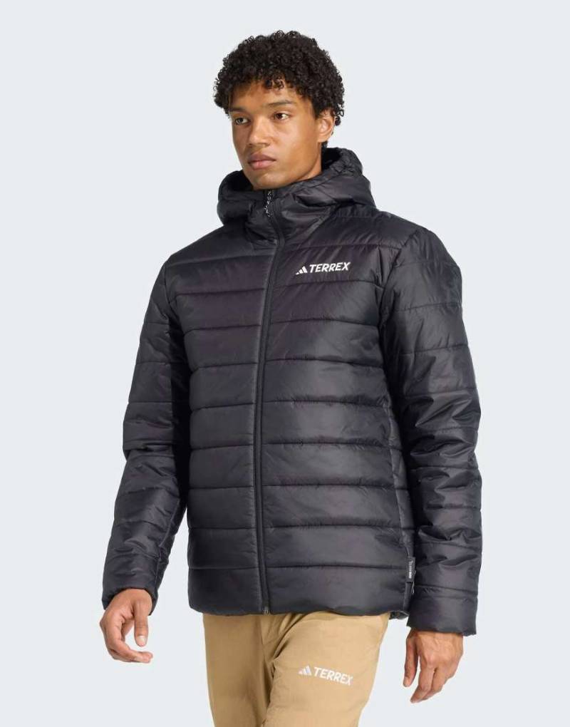 adidas Performance - Terrex Multi Essentials - Wattierte Jacke in Schwarz mit Climawarm-Technologie und Kapuze adidas Performance - Terrex Multi Essentials - Wattierte Jacke in Schwarz mit Climawarm-Technologie und Kapuze von adidas performance