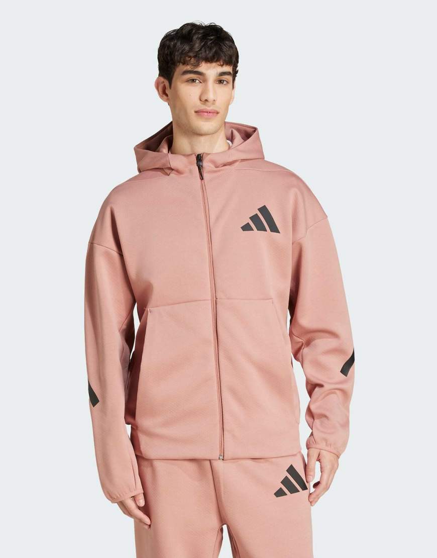 adidas Performance - Z. N.E. - Trainingsjacke in Warm Clay mit Reißverschluss und Kapuze-Braun von adidas performance