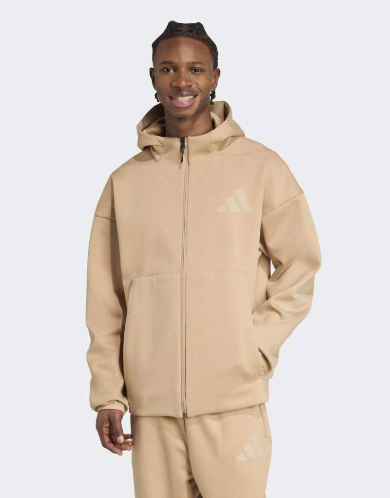 adidas Performance - Z. N.E. - Trainingsjacke in warmem Sandstein/Lehmbeige mit Kapuze und Reißverschluss-Braun von adidas performance