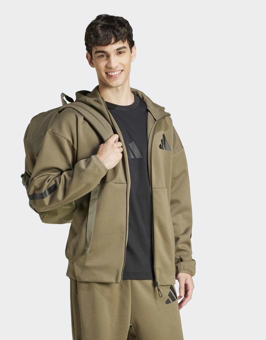 adidas Performance - Z. n.e. - Trainingsjacke in Olive Strata mit Reißverschluss und Kapuze-Grün von adidas performance