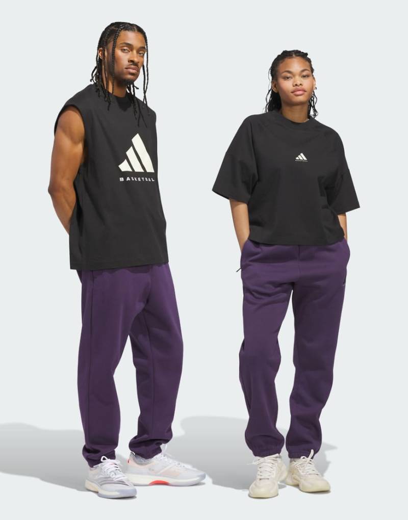 adidas Performance - adidas Basketball - Unisex-Jogginghose aus Fleece in Aurora Plum-Lila von adidas performance
