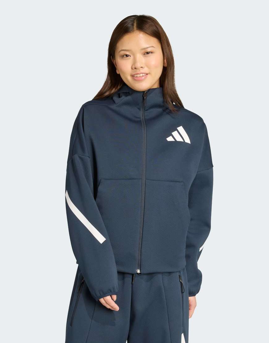 adidas Performance - adidas Z. N.E. - Kapuzenjacke in Aurora Ink mit Reißverschluss-Marineblau adidas Performance - adidas Z. N.E. - Kapuzenjacke in Aurora Ink mit Reißverschluss-Marineblau von adidas performance